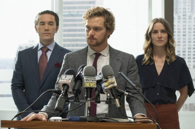Joy Meachum (Jessica Stroud) and Ward Meachum (Tom Pelphrey) stand beside Danny Rand/Iron Fist (Finn Jones)