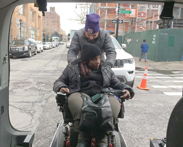 Valerie Joseph is part of an MTA pilot program that allows her to use a ride-sharing app to hail a wheelchair-accessible taxi on demand.