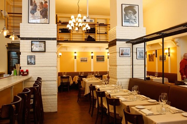 031811italy.jpg Authentic Italian: Experience Italia (without having to buy that expensive plane ticket) at Roman-style trattoria Sora Lella. If you've ever traveled to Italia you've most likely experienced the lovely tradition of cicchetti, plates of food set out for bar patrons to accompany their pre-dinner drinks. Assorted crostini, meatballs, lightly fried veggies and other delicious finger foods are set out nightly from 5 p.m. to 8 p.m. and are free with purchase of a (half price!) drink. Emporio in Nolita has a similar spread with pizza, olives and other snacks from 5 p.m. to 6 p.m. with $5 Stella drafts and $4 glasses of Montepulciano and Trevini.Sora Lella, 300 Spring St., SoHo, (212) 366-4749Emporio, 231 Mott St., Nolita, (212) 966-1234
