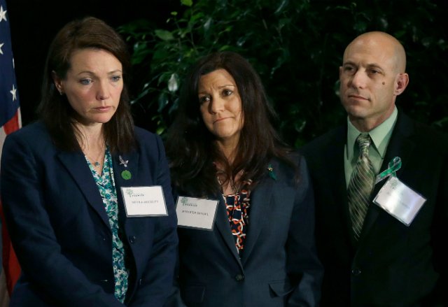 Jeremy Richman stands next to his wife Jennifer Hensel and Nicole Hockley, another parent of a Sandy Hook victim, at a Sandy Hook Promise news conference in 2013