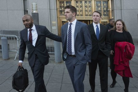 Billy McFarland leaves federal court after pleading guilty to wire fraud charges, in New York.