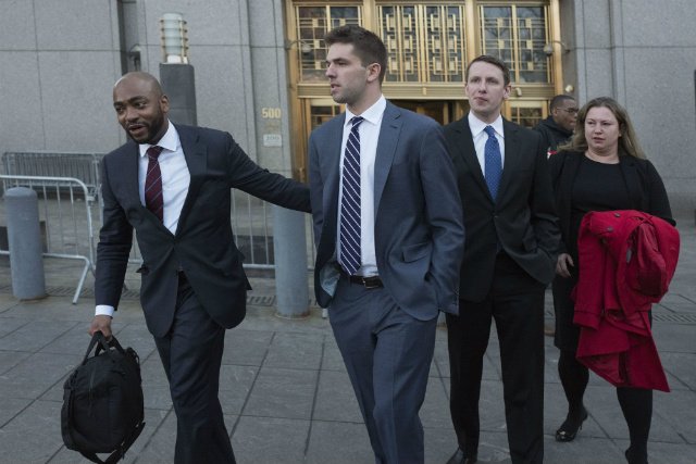 Billy McFarland leaves federal court after pleading guilty to wire fraud charges, in New York.