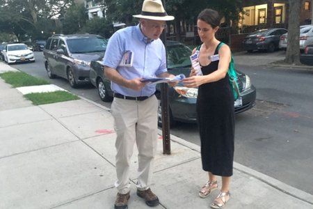 Blake Morris campaigns with volunteer Megan Piontkowski in the 17th State Senate district in Brooklyn.