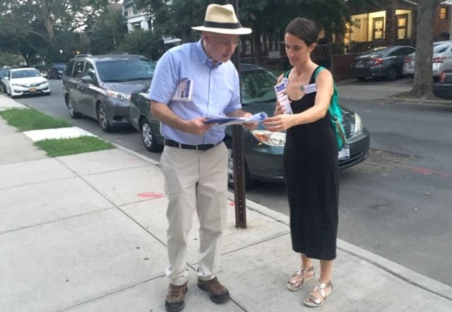 Blake Morris campaigns with volunteer Megan Piontkowski in the 17th State Senate district in Brooklyn.