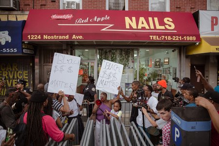 Protesters enraged by recent footage of nail salon employees assaulting black customers in Flatbush, Brooklyn, held a march and blocked another salon on Nostrand Avenue Tuesday night.<br>