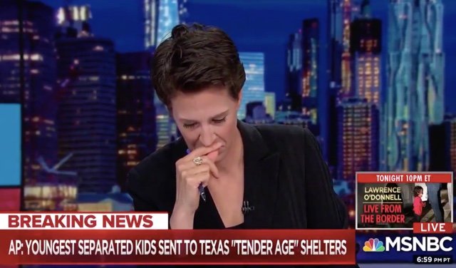 Rachel Maddow reacts while reading the AP story about the babies and toddlers