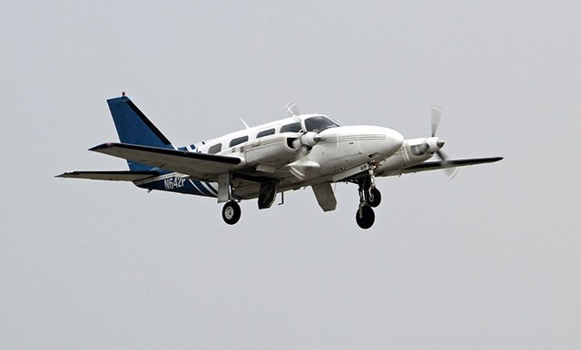 Photograph of a Piper Navajo PA31 by Rob Hodgkins / Flickr