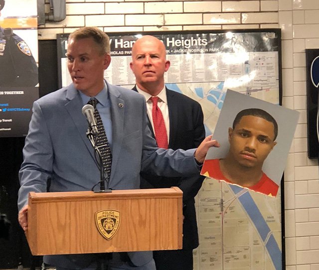NYPD Chief of Detectives Dermot Shea holds up a photo of Drayton last week