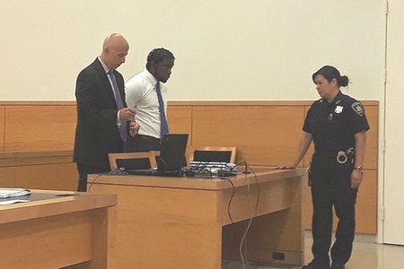 O'Keefe Thompson, right, with his lawyer Michael Martinez