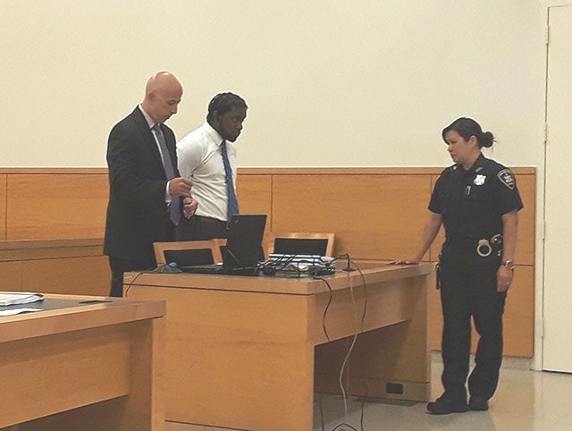 O'Keefe Thompson, right, with his lawyer Michael Martinez