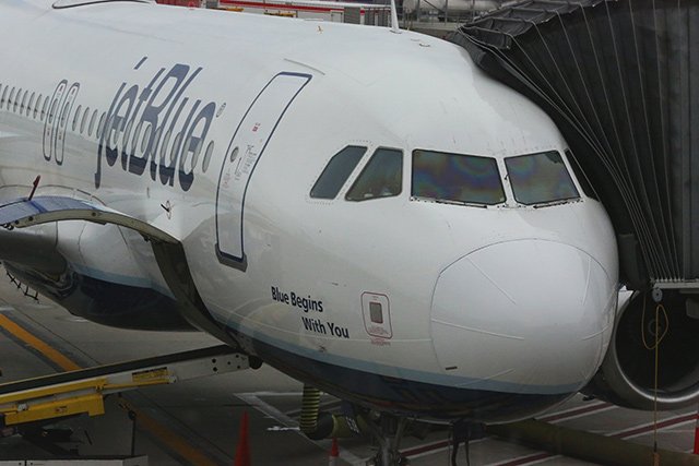 A JetBlue plane on the tarmac at JFK Airport in 2018