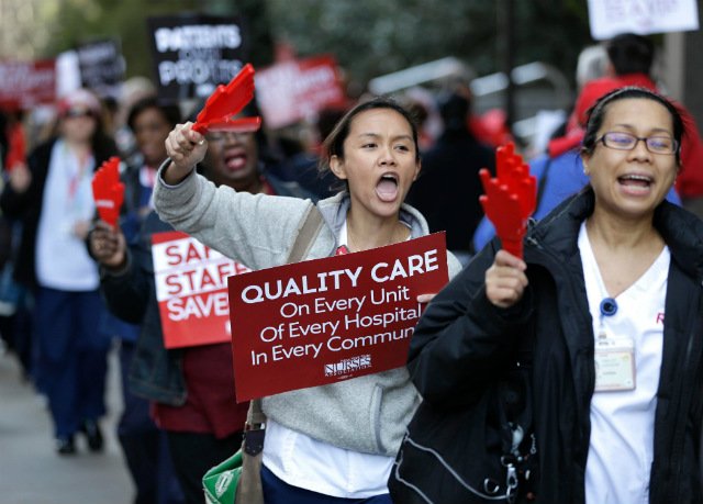 Nurses and their supporters protest in front of New York-Presbyterian Hospital in April of 2015