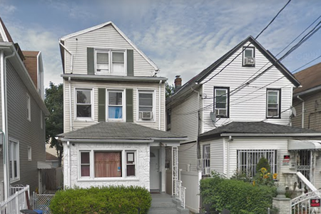 The Jamaica, Queens, house where police say Rizwan was shot, on the left