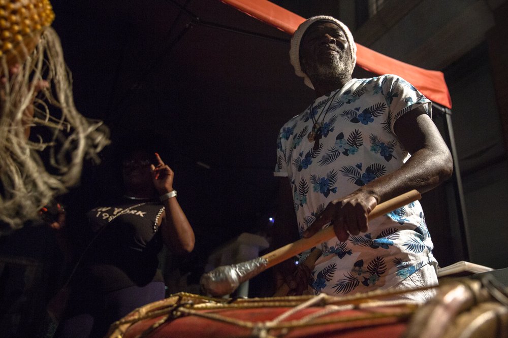 262597c3b082718jouverttour-9-jpg.jpeg James Alleyne plays the Tassa Bass drum at an evening Kutters Rhythm Section practice last Thursday in East Flatbush.