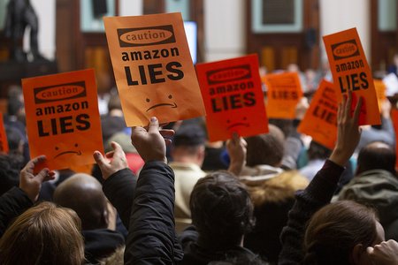 Protesters at last week's City Council hearing on the Amazon deal