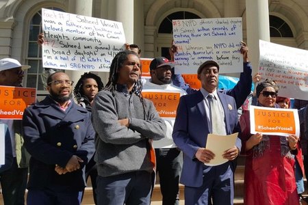 Saheed Vassel's father delivering remarks outside City Hall on Wednesday