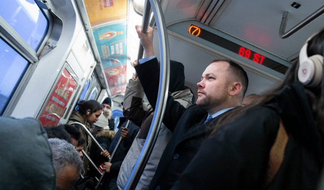 City Council Speaker Corey Johnson looking very serious in one of 17 photos that feature him in various forms of transit, in his report on changing transportation in New York City