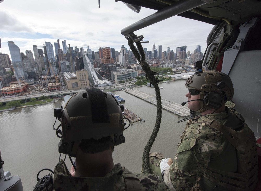 35e93350134148334304_4b818ba8b7_k-jpg.jpeg Explosive Ordnance Disposal Technicians assigned to Explosive Ordnance Disposal Group (EODGRU) 2, fly past the New York City skyline on a MH-60S Sea Hawk helicopter assigned to “The Night Dippers” of Helicopter Sea Combat Squadron (HSC) 5 as part of Fleet Week New York 2017. (U.S. Navy photo by Mass Communication Specialist 2nd Class Charles Oki)