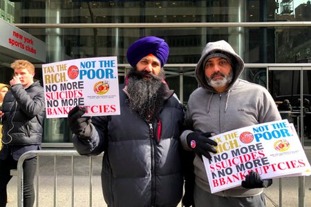 Two cab drivers at Wednesday's protest outside Governor Cuomo's office