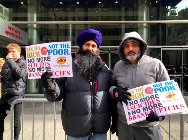 Two cab drivers at Wednesday's protest outside Governor Cuomo's office