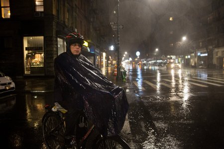 Dong Shixiang delivers food on his illegal e-bike on the Upper West Side in 2018