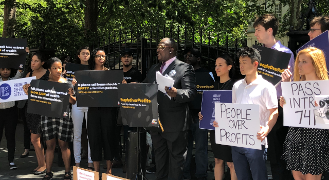 Dwayne Lee speaking outside City Hall yesterday before the bill passed