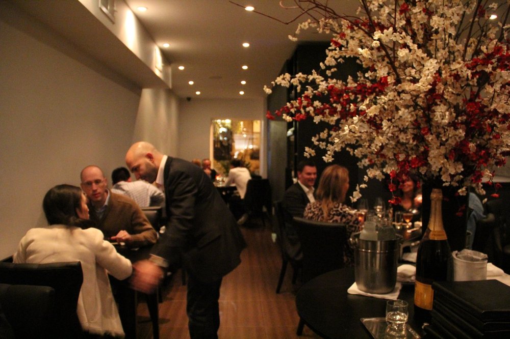 Co-owner Alessandro Borgognone greets guests