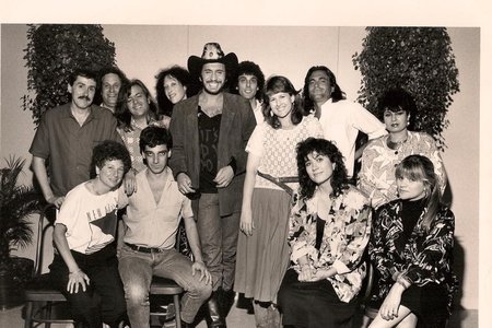 Kiss was actually always the easiest act to interview, although there was always the danger of being hit on by The Tongue, Gene Simmons. And they were part of one of my best-ever afternoons of all time: backstage in the press lounge at the 1988 Monsters Of Rock show at Giants Stadium with the late Eric Carr, who drew a lot of cute caricatures of his rock star friends for myself and my colleagues from Rock Scene. It made up for the fact that we could not find our car in the giant parking lot for six hours after the show ended.<br/>Kiss also knew how to throw a good party, and they were one of the last bands to have one at the Playboy Club in Manhattan right before it closed. It was that night that Gene Simmons twirled me around like a ballerina... which led to me falling on my face on the dance floor in my four-inch heels. This was a time when record labels had money to spend, and the parties they fronted for metal bands were pretty opulent. <br>(Courtesy of Anne Raso)