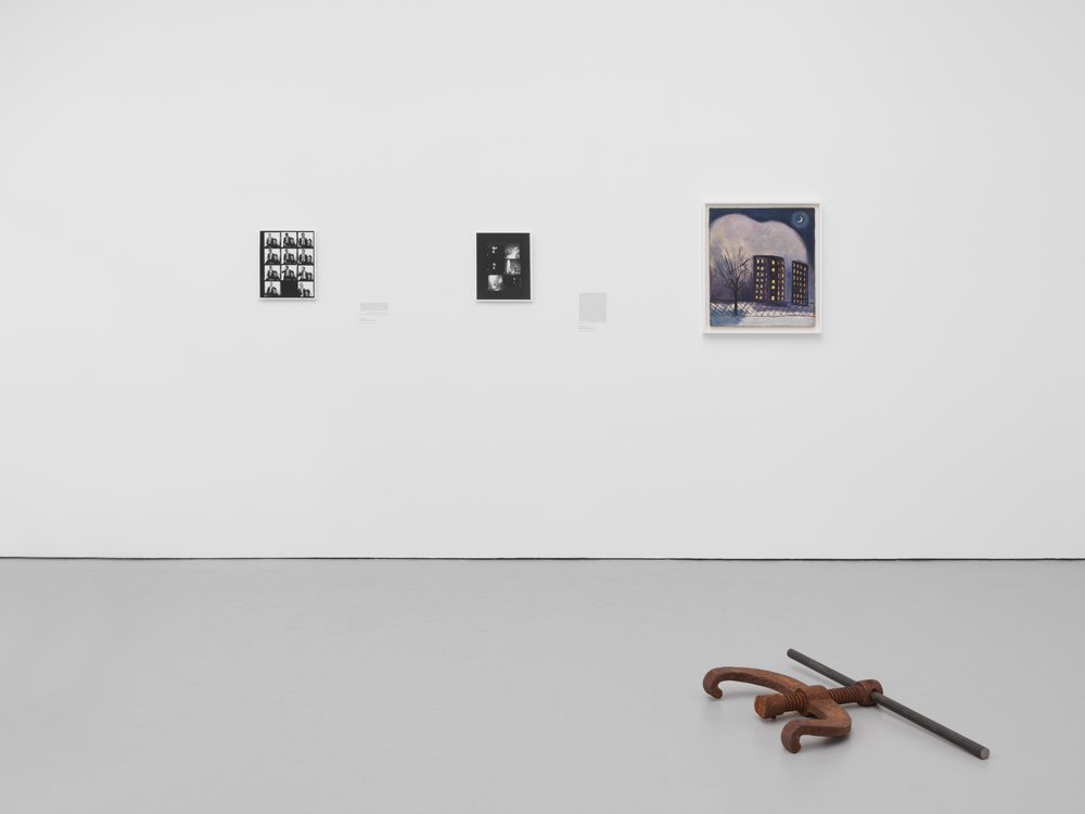 d2585d930hiltonbaldwindz19show2019_install_12-jpg.jpeg On the wall: Photographs of Baldwin by Richard Avedon and a painting by Alice Neel on. On the ground: Cameron Rowland's "Jim Crow" (2017), showing a <a href="http://heikemoras.com/god-made-my-face/">"Jim Crow rail bender"</a>. (Courtesy of David Zwirner)