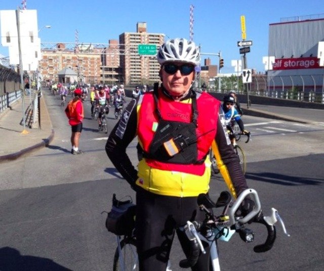 Schlicting in his capacity as a a captain of the Five Boro Bike Tour in 2013