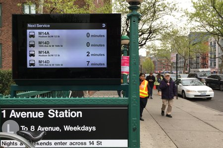 Subway signs promoting the M14 bus<br>