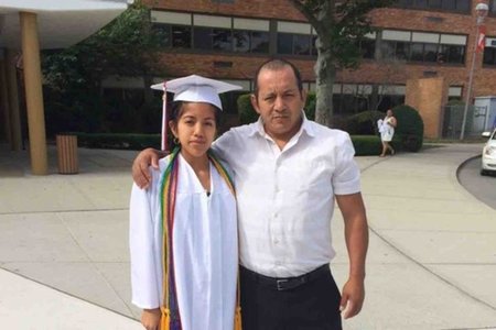 Edisson Barros and his daughter Paola at her high school graduation