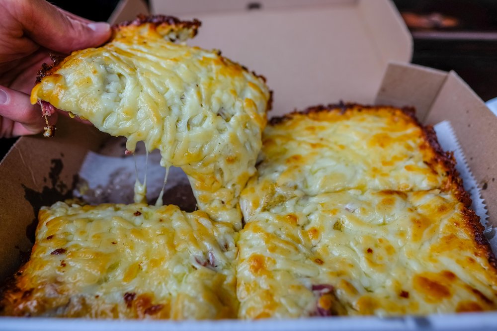 Mustard Pie with corned beef and sauerkraut ($12)