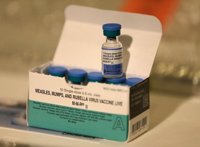 The measles vaccine, typically combined with the rubella and mumps vaccines.