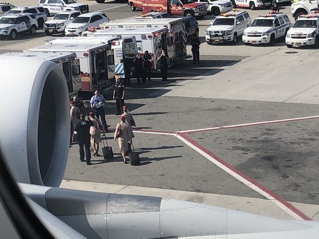 The cabin crew deplaning