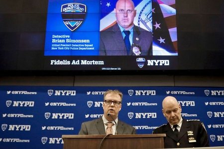 New York Police Department Chief Terence Monahan, right, and Deputy Chief Kevin Maloney, left, hold a press conference, at police headquarters
