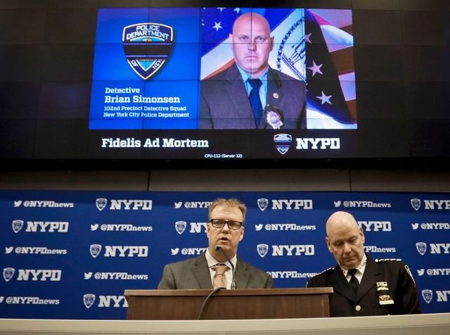 New York Police Department Chief Terence Monahan, right, and Deputy Chief Kevin Maloney, left, hold a press conference, at police headquarters