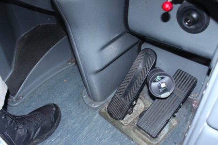 Federal investigators re-enacted a scenario of a dropped thermos bottle causing runaway acceleration and preventing braking.