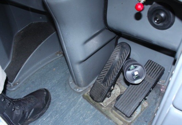 Federal investigators re-enacted a scenario of a dropped thermos bottle causing runaway acceleration and preventing braking.