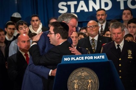Mayor de Blasio embracing Councilman Kalman Yeger at an event last month