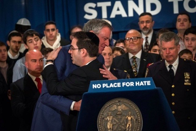 Mayor de Blasio embracing Councilman Kalman Yeger at an event last month